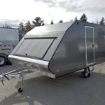 Mission Trailers 101×12 Aluminum 2-Place Crossover w/Mats & Guides, Rear Canopy